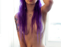 Sexy little hipster with purple hair and pierced nipples