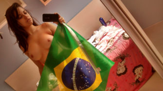 Sexy football fan amateur Betty Boop holding Brazil flag