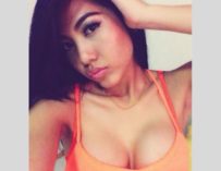 Mikie k in lowcut orange top