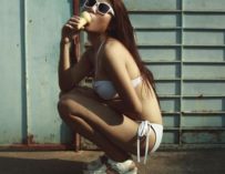 Nene sucking on her vanilla ice cream