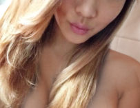 Sexy asian blonde asian with just enough nipple showing